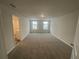 Spacious bedroom with neutral walls and carpeting at 6303 Distant Haze Pl, Palmetto, FL 34221