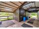 Interior of barn showing stalls, storage, and wash area at 655 Appaloosa Rd, Tarpon Springs, FL 34688