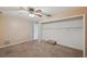 Bedroom with large closet and ceiling fan at 655 Appaloosa Rd, Tarpon Springs, FL 34688