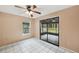 Bright dining room with sliding doors to patio at 655 Appaloosa Rd, Tarpon Springs, FL 34688