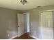 Bedroom with tile floors and neutral walls at 8602 Stoner Rd, Riverview, FL 33569