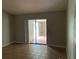 Bedroom with tile floors and sliding glass doors at 8602 Stoner Rd, Riverview, FL 33569