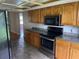 Kitchen with granite countertops and stainless steel appliances at 8602 Stoner Rd, Riverview, FL 33569