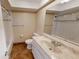 Clean bathroom with a tiled shower/tub combo and vanity at 5900 5Th N Ave # D6, St Petersburg, FL 33710