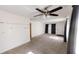 Sunlit living room, featuring carpet and neutral walls at 5900 5Th N Ave # D6, St Petersburg, FL 33710