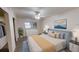 Spacious main bedroom with a large closet and plush bedding at 5900 5Th N Ave # D6, St Petersburg, FL 33710