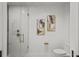 Stylish bathroom featuring a glass-enclosed shower and modern fixtures, with tasteful wall art at 777 3Rd N Ave # 1504, St Petersburg, FL 33701