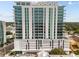 A full exterior shot of the modern high-rise condominium building with floor to ceiling windows at 777 3Rd N Ave # 1504, St Petersburg, FL 33701