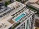 Aerial view of rooftop pool with city views and lounge area at 777 3Rd N Ave # 1504, St Petersburg, FL 33701