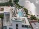 Top-down shot of pool area with a view of a pond at 777 3Rd N Ave # 1504, St Petersburg, FL 33701