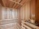 A warm wooden sauna with multiple seating levels and traditional sauna accessories at 777 3Rd N Ave # 1504, St Petersburg, FL 33701