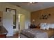 Bedroom with double bed and access to bathroom at 10131 Old Tampa Bay Dr, San Antonio, FL 33576