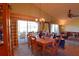 Dining room with wooden table and chairs, overlooking the golf course at 10131 Old Tampa Bay Dr, San Antonio, FL 33576