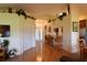 Bright and spacious entryway with wood floors and kitchen views at 10131 Old Tampa Bay Dr, San Antonio, FL 33576
