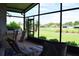 Enjoy the view from this screened porch overlooking the golf course at 10131 Old Tampa Bay Dr, San Antonio, FL 33576