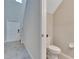 Small powder room with toilet and pedestal sink at 12716 Hampton Hill Dr, Riverview, FL 33578