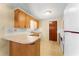 Cozy kitchen featuring Formica countertops and white appliances at 5824 11Th St, Zephyrhills, FL 33542