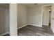 Bedroom with wood-look floors and closet at 2409 S 70Th St, Tampa, FL 33619