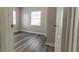 Bright bedroom with wood-look floors and neutral walls at 2409 S 70Th St, Tampa, FL 33619