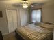 Bedroom with queen-size bed and double closets at 809 Daphne Dr, Brandon, FL 33510