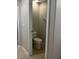 Small half bathroom with tile flooring and neutral wall color at 13034 Avalon Crest Ct, Riverview, FL 33579