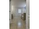 Bathroom featuring tile flooring, bathtub, and glass door shower at 13034 Avalon Crest Ct, Riverview, FL 33579