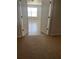 Bright bedroom showcases wood floors and a large window, creating a warm, inviting space at 13034 Avalon Crest Ct, Riverview, FL 33579