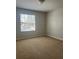 Bedroom with carpet flooring and natural light from the window at 13034 Avalon Crest Ct, Riverview, FL 33579