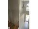 Bright foyer with high ceilings, pendant lighting, tile flooring, and staircase to the second floor at 13034 Avalon Crest Ct, Riverview, FL 33579