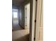 Hallway with carpet and access to the other rooms at 13034 Avalon Crest Ct, Riverview, FL 33579