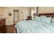 Bedroom with ensuite bathroom and view of a second bedroom at 3133 Lake Pine Way # D1, Tarpon Springs, FL 34688