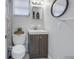 Clean bathroom with a vanity, toilet and shower at 1043 60Th N Ave, St Petersburg, FL 33703