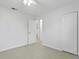 Bright bedroom with tile floors and access to bathroom at 4210 W Bay Vista Ave, Tampa, FL 33611