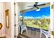 Private balcony with golf course views and comfortable seating at 7877 Bayou Club Blvd, Seminole, FL 33777