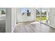 Light-filled dining area with sliding glass doors leading to backyard at 13728 Sunlight Meadow Dr, Riverview, FL 33578