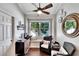 Cozy breakfast nook with window seating, a ceiling fan, and views of the backyard at 11335 Flora Springs Dr, Riverview, FL 33579