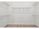 Spacious closet with wire shelving and hanging rods at 13806 Sunlight Meadow Dr, Riverview, FL 33578