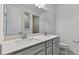 Double vanity bathroom with modern finishes at 13808 Sunlight Meadow Dr, Riverview, FL 33578