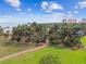 Aerial view of lush tropical park with palm trees and walking path at 1120 N Shore Ne Dr # 703, St Petersburg, FL 33701