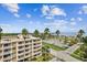 Aerial view of building and surrounding area, showing parking and water at 1120 N Shore Ne Dr # 703, St Petersburg, FL 33701