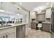 Modern kitchen with stainless steel appliances and granite countertops at 1120 N Shore Ne Dr # 703, St Petersburg, FL 33701