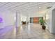 Clean and bright lobby with seating area and elevators at 1120 N Shore Ne Dr # 703, St Petersburg, FL 33701