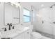 Modern bathroom with marble shower and vanity at 2906 W Braddock St, Tampa, FL 33607