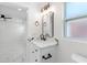 Stylish bathroom with a white vanity, quartz countertop, and a black faucet at 2906 W Braddock St, Tampa, FL 33607