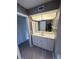 Bathroom with vanity, sink, mirror, and modern lights above at 3280 Southfield Ln # 804, Sarasota, FL 34239