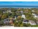 Aerial view of a neighborhood, showcasing waterfront and various house styles at 3605 S Omar Ave, Tampa, FL 33629