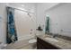 Bathroom with shower/tub combo and granite countertop at 3948 Mossy Limb Ct, Palmetto, FL 34221