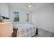 Bedroom with ceiling fan and two windows at 3948 Mossy Limb Ct, Palmetto, FL 34221