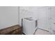 Convenient laundry room with washer, dryer, and shelving at 3948 Mossy Limb Ct, Palmetto, FL 34221