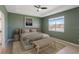 Peaceful main bedroom with lake view and soothing color palette at 3948 Mossy Limb Ct, Palmetto, FL 34221